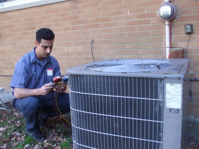 Budget Ohio technician working on HVAC Unit